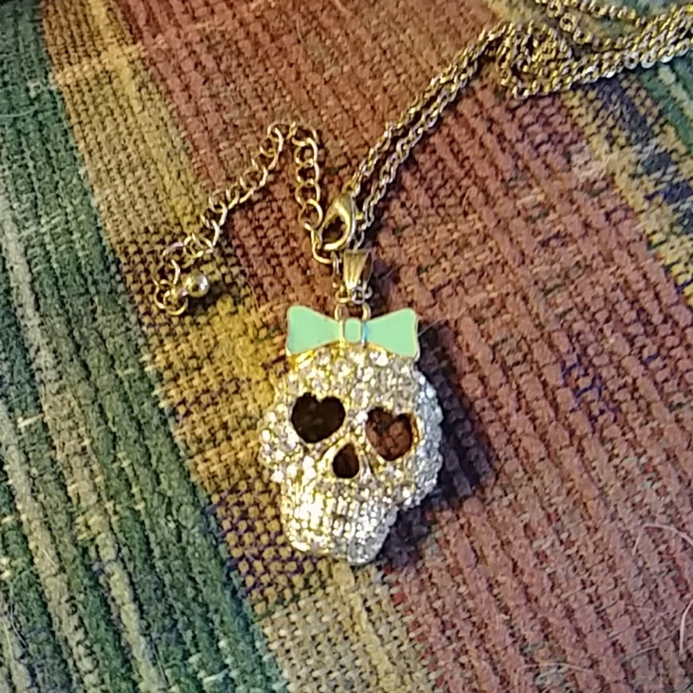 Gold skull necklace